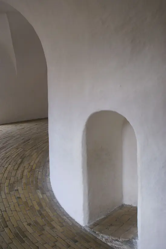 White plaster archways in soft daylight